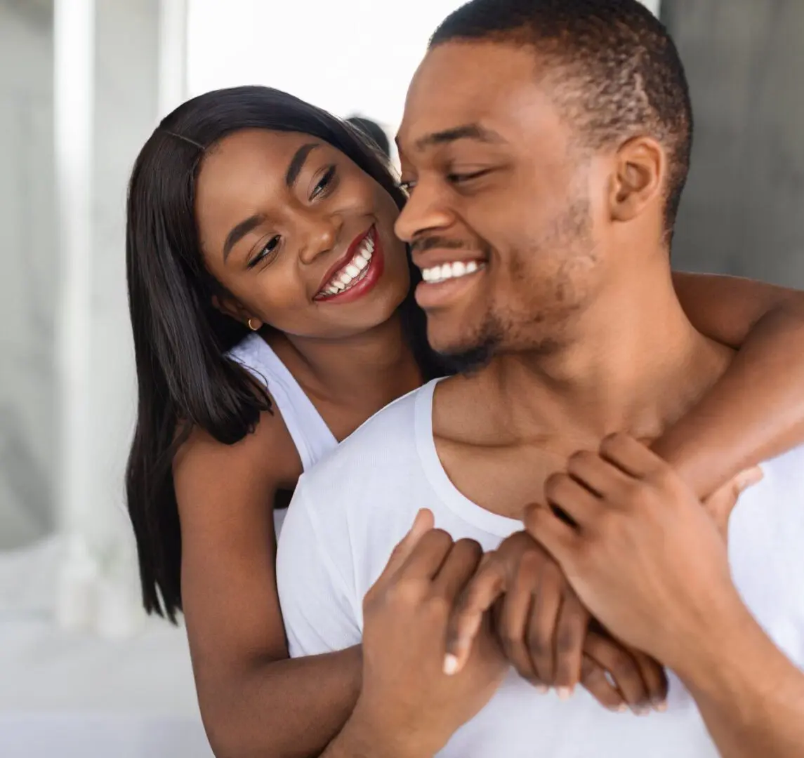 portrait of romantic african american couple embracing
